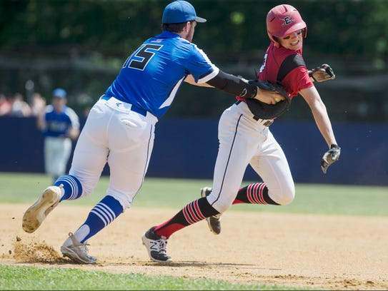Middlesex's Mike Salerno puts a tag on baserunner Robbie