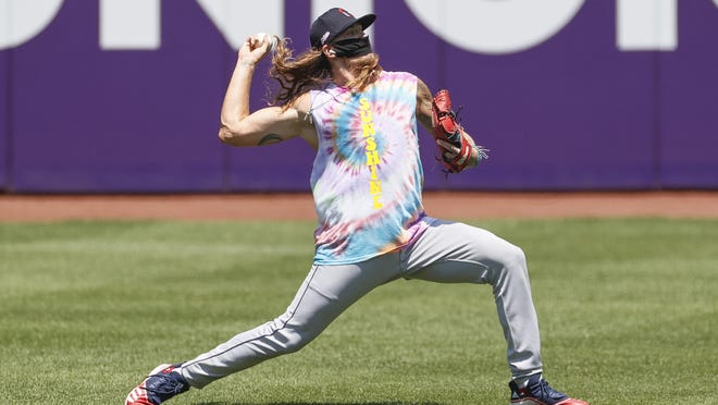 Indians starting pitcher Mike Clevinger throws during  practice at Progressive Field on Monday.
