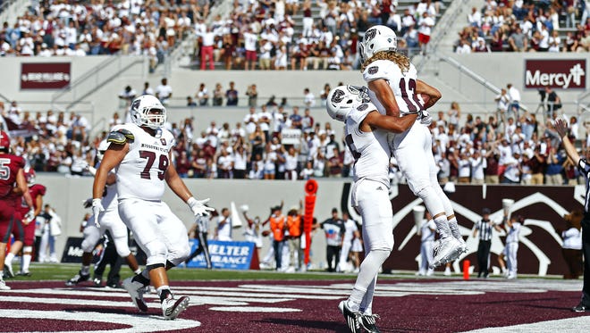 Eric Christophel, right, scored a key touchdown in Missouri State's only victory in 2015.