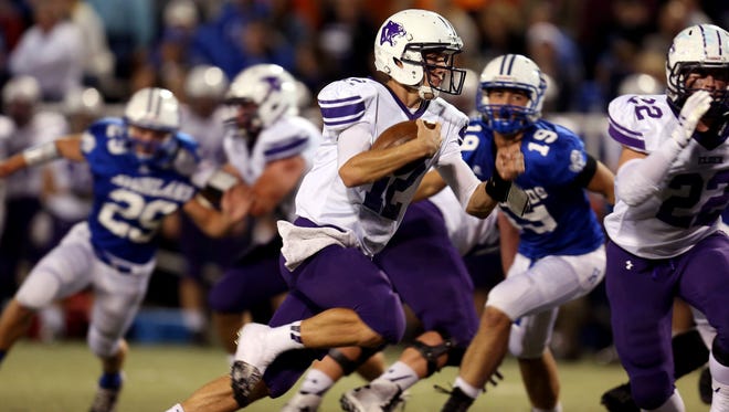 Elder quarterback Peyton Ramsey runs for a second-quarter touchdown in the Panthers' win over Highlands on Friday.