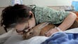 Diana Metzgus, of Newbury Park, kisses Henry, a Flemish