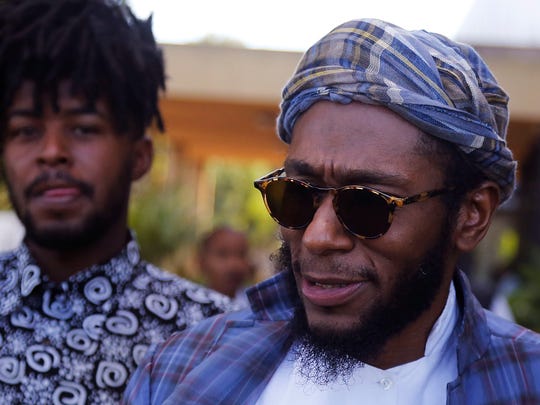Yasiin Bey, formerly known as Mos Def, right, in Bellville, South Africa, in 2016.