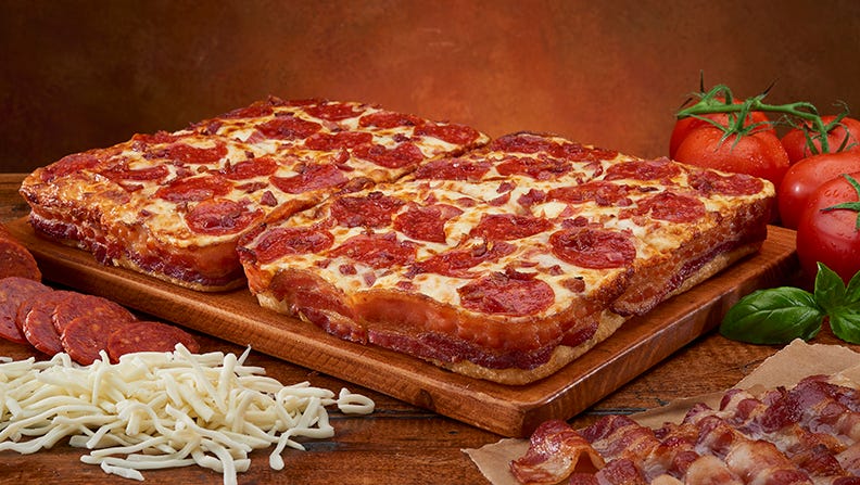 Little Caesars Tries Bacon Wrapped Crust Pizza Usa Today