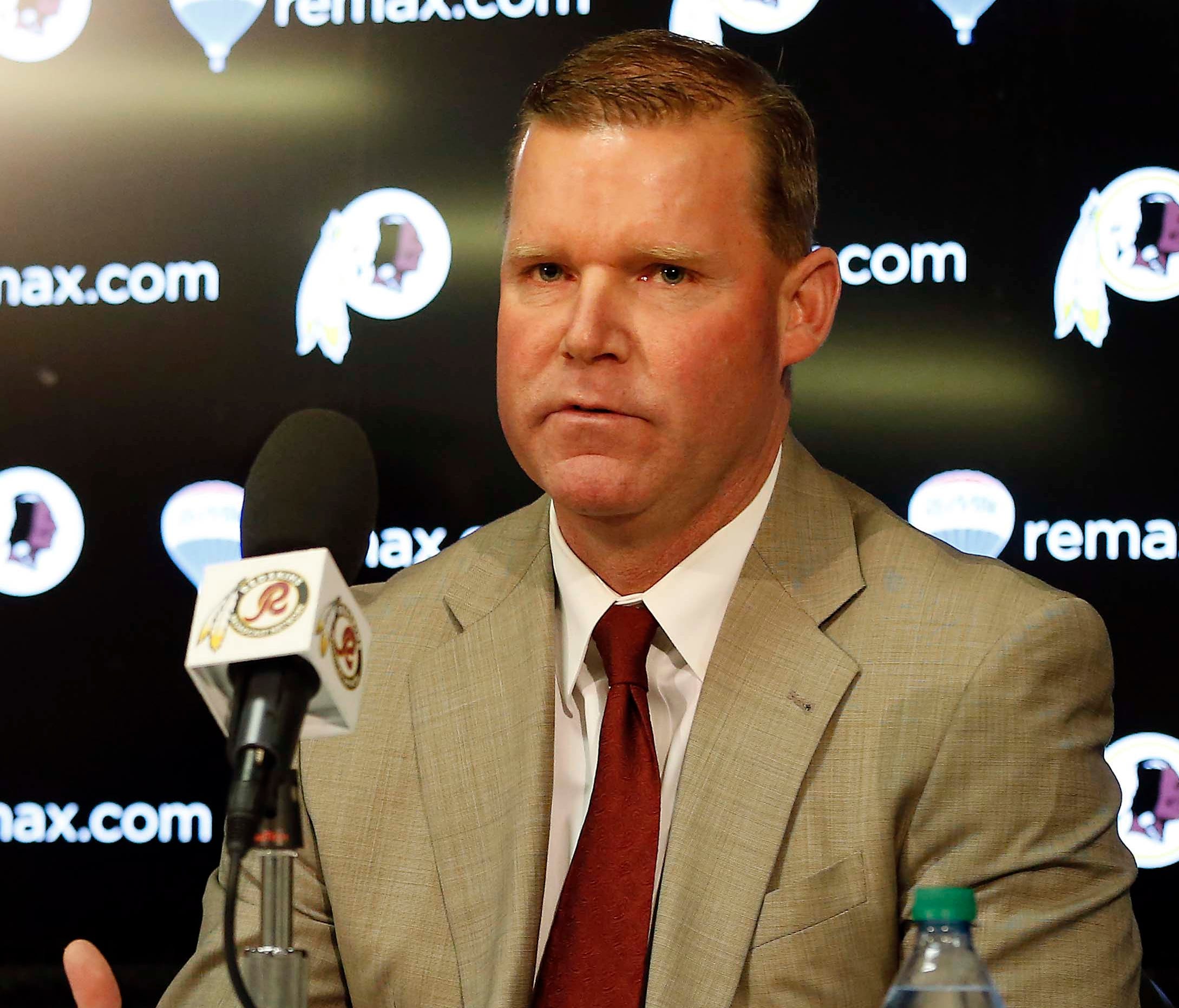 Washington Redskins new general manager Scot McCloughan (right) speaks during his introductory press conference at Redskins Park.