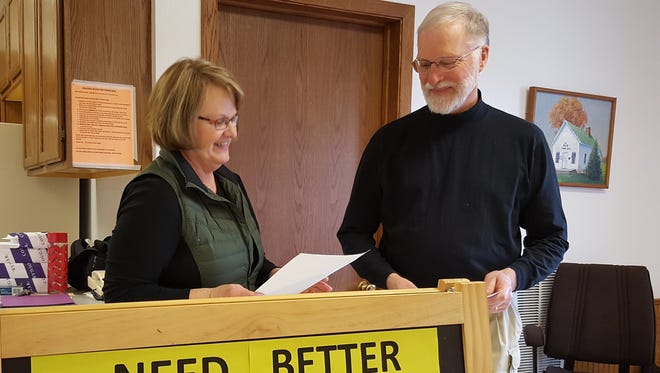 Brenda Budleski and Chuck Krueger volunteered all day at the Reid Town Office on April 5, 2016, educating voters about bringing faster, more reliable internet to Reid.