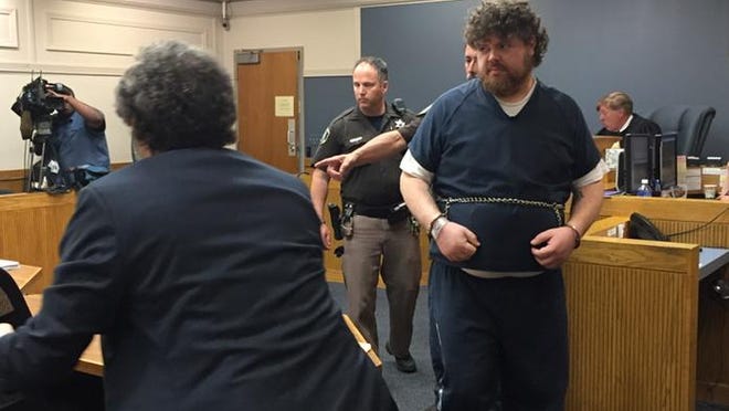 Timothy Fradeneck of Eastpointe is led into district court Tuesday, May 27, 2015, for his preliminary hearing on murder charges in the strangulation deaths of his wife and two children.