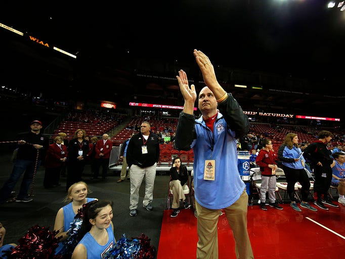 Arrowhead head coach Craig Haase reacts to the school's