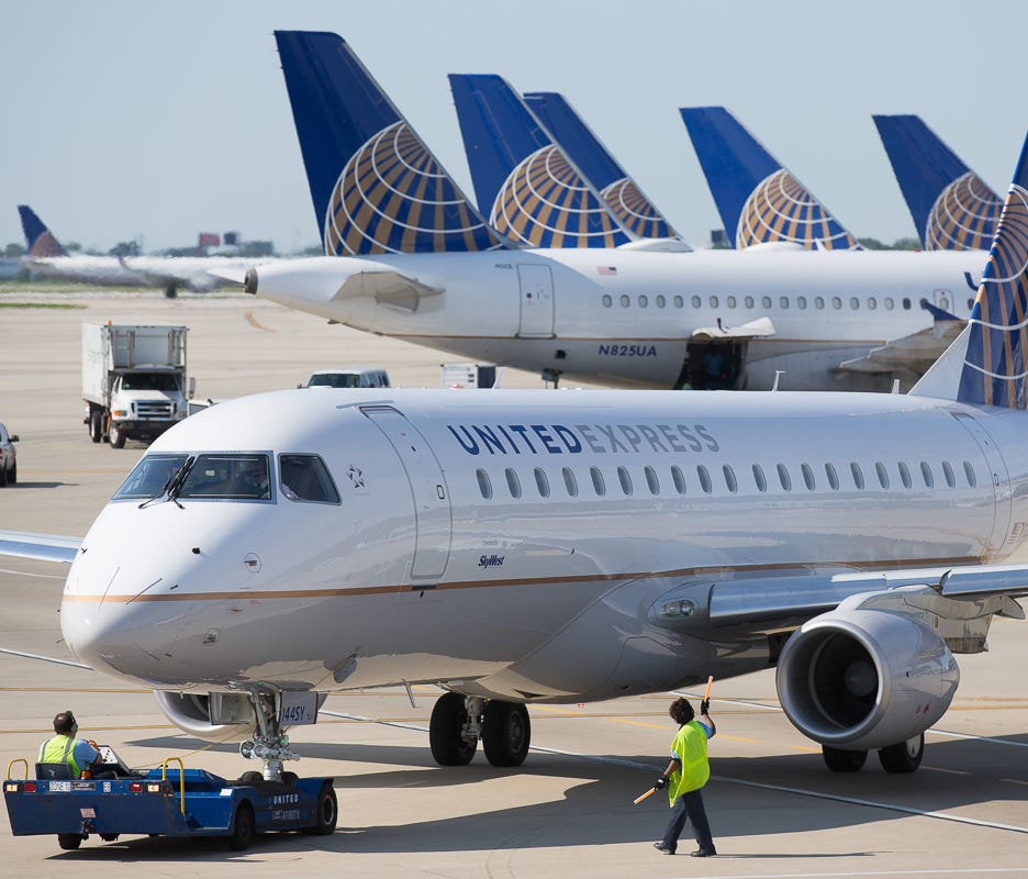 A United Express Embraer E170 jet prepares for departure from Chicago O'Hare in June 2015.