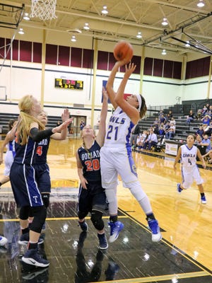 Odem's Juliana Alcala goes up to the hoop during the Region IV-3A girls basketball final at Seguin High School on Saturday, Feb. 25.