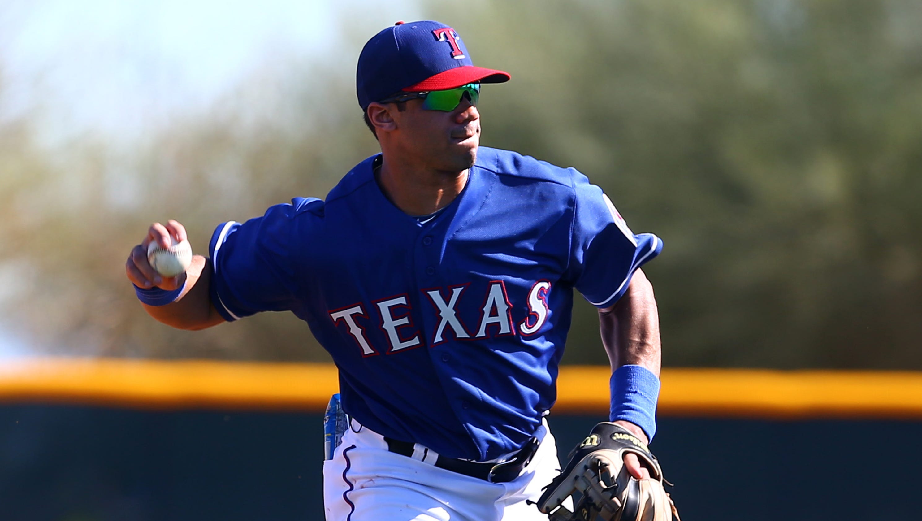 Russell Wilson a hit with Rangers, keeps baseball dream alive