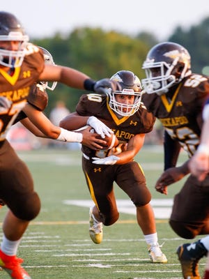Kickapoo’s Malachi Stout takes a handoff during Friday’s victory over Joplin. Stout finished with five first-half touchdowns.