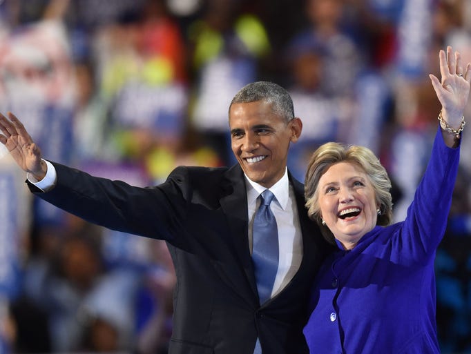 President Barack Obama waves with Democratic presidential