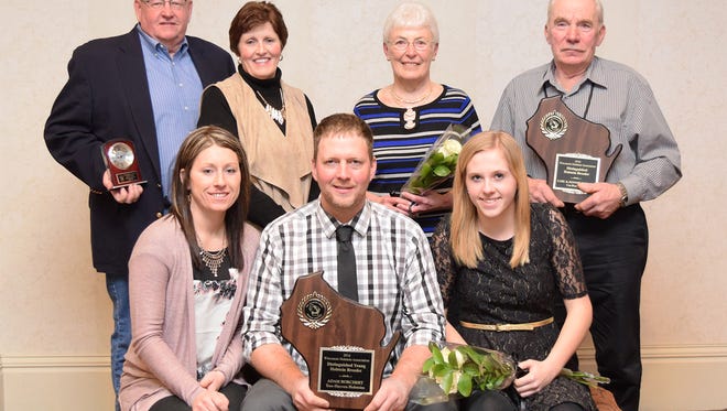 During the Wisconsin Holstein Association annual convention in Appleton this past weekend, Rick and Paula Bovre, owners of The Great Northern Land and Cattle Company, were named the 2017 recipient of the WHA Service Award. (back, left). The 2017 recipient of the Distinguished Holstein Breeder Award was bestowed upon Dodge County breeders, Carl and Bonnie Werner, of Car-Bon Holsteins (back, right). Adam Borchert of Tree-Hayven Holsteins is the 2017 Young Holstein Breeder Award recipient. He is pictured with his girlfriend Chelsey Karl (left) and daughter Aaliyah.