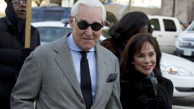 On Nov. 14, 2019, Roger Stone accompanied by his wife Nydia Stone, right, arrives at federal court in Washington.