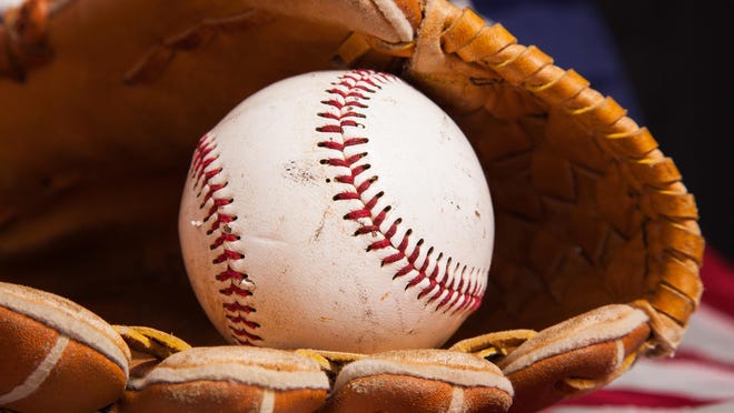 A baseball and glove with an American flag background.