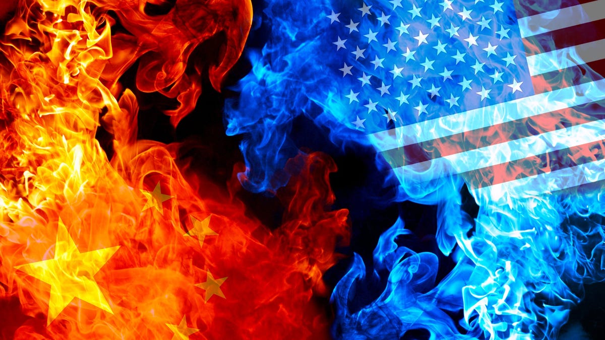 Representations of flags from the U.S. and China in fire and smoke