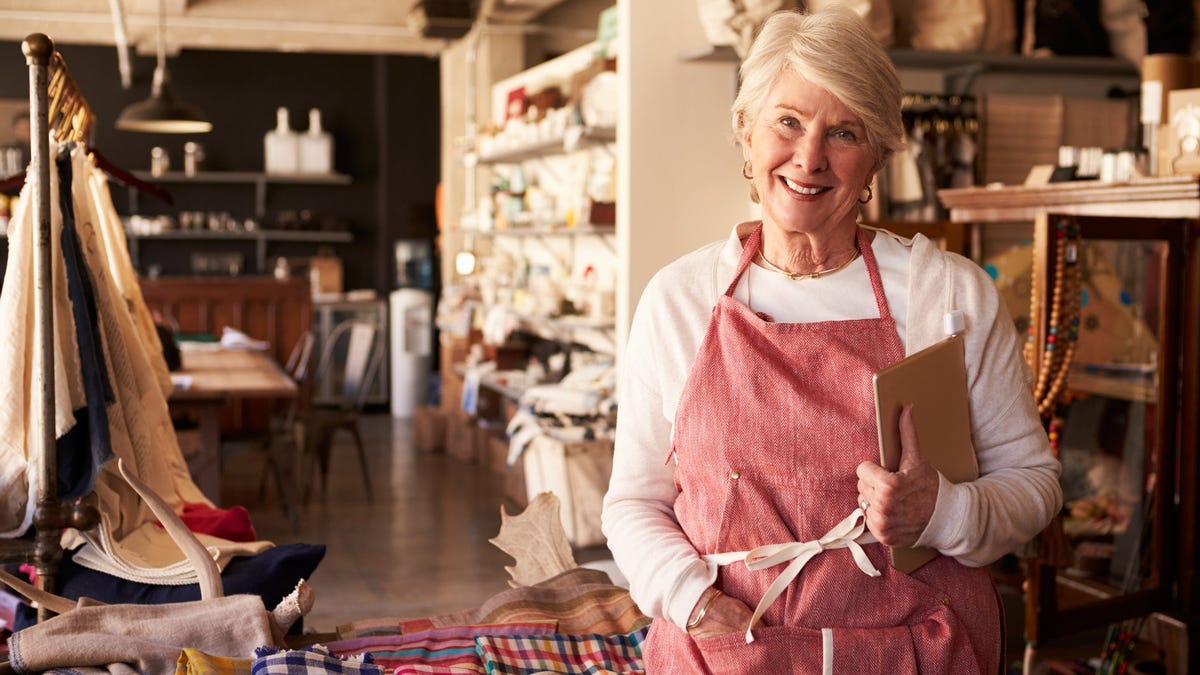 Older woman working in a store