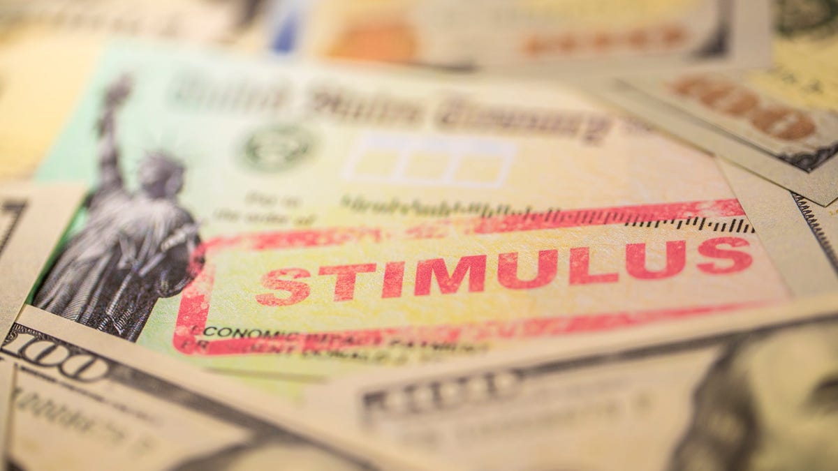 Stimulus check and hundred dollar bills