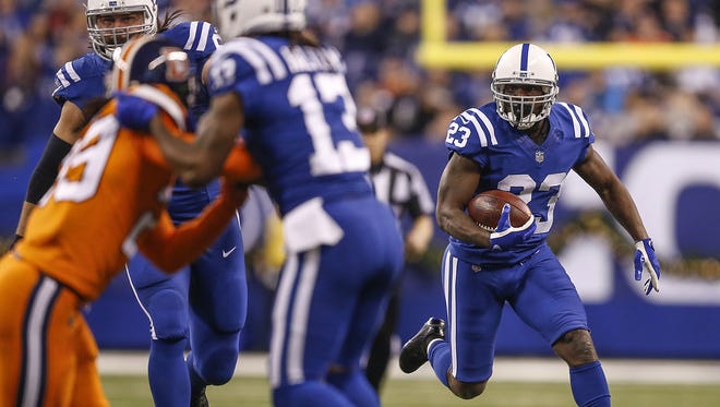 Indianapolis Colts running back Frank Gore (23) takes off on a long run on a screen on the Colts' first drive of the game against the Denver Broncos at Lucas Oil Stadium in Indianapolis on Thursday, Dec. 14, 2017.