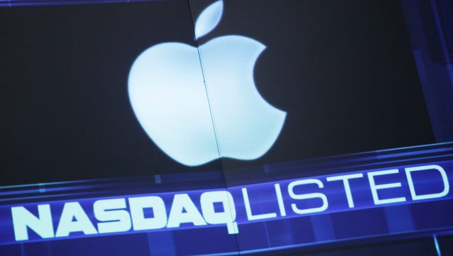 The Apple logo on a stock ticker at the Nasdaq MarketSite in New York.