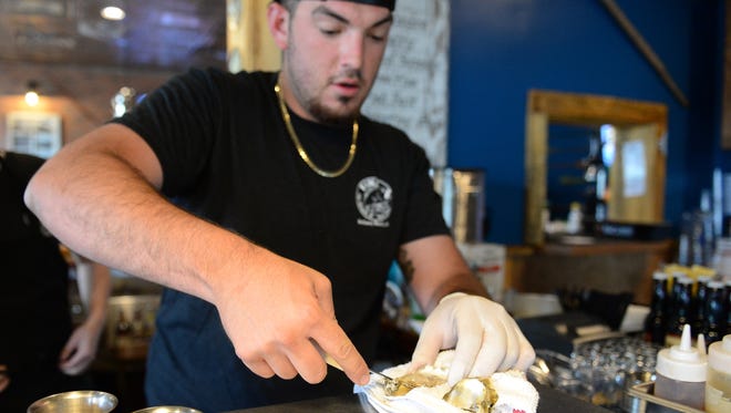 File photo of Wyatt Richardson, Oyster shucker at Fins Ale House & Raw Bar located in the Marketplace at Sea Colony in Bethany Beach.