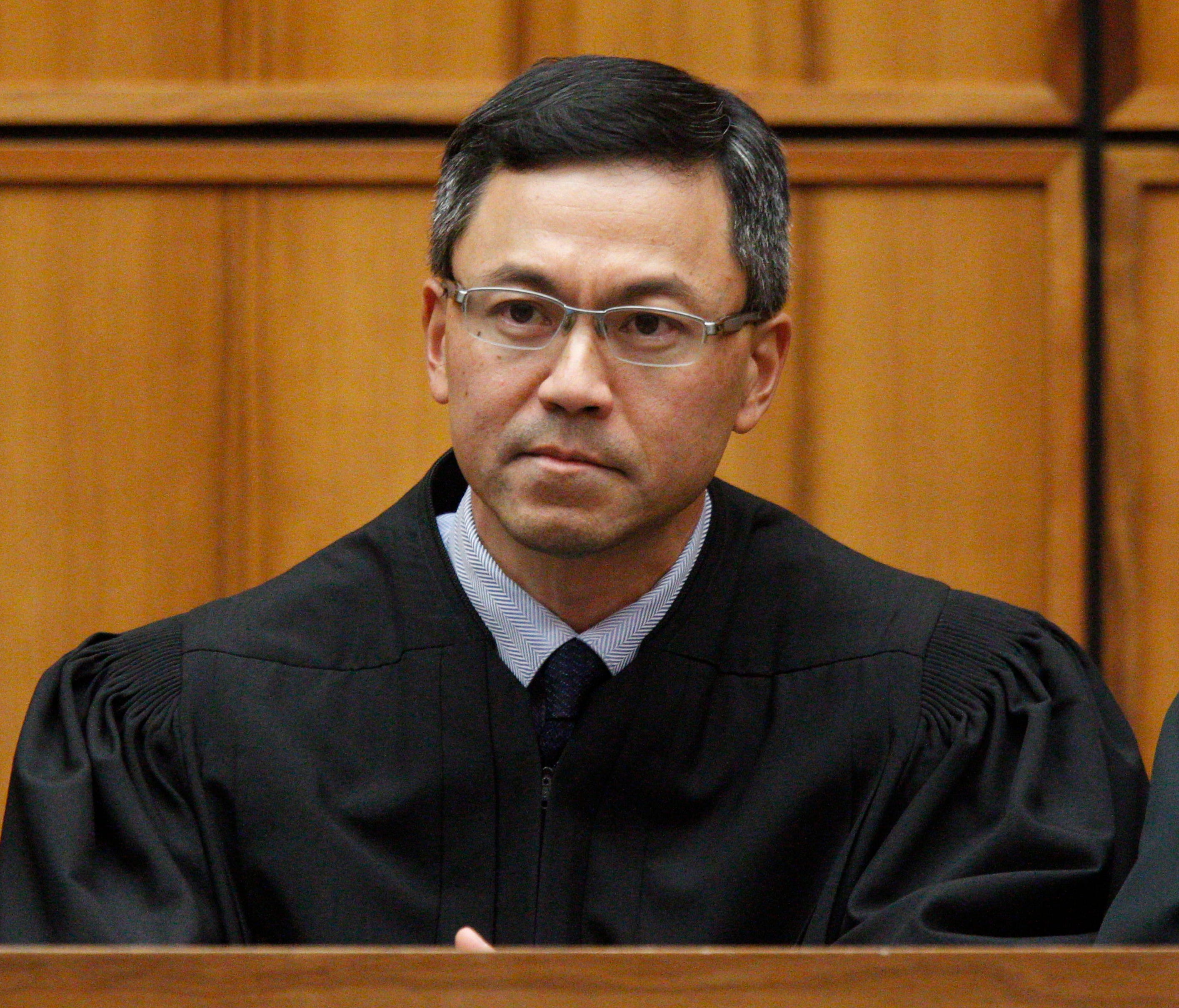 This December 2015 photo shows U.S. District Judge Derrick Watson in Honolulu. The judge blocked President Trump's revised travel ban on March 15, 2017, hour before it was to take effect.