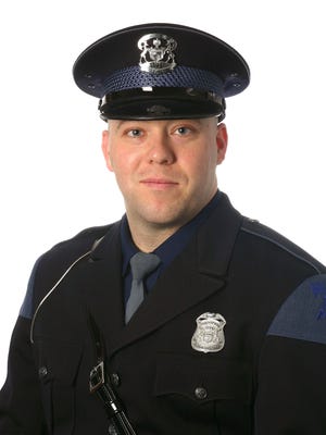 Michigan State Police of Trooper Chad Wolf.