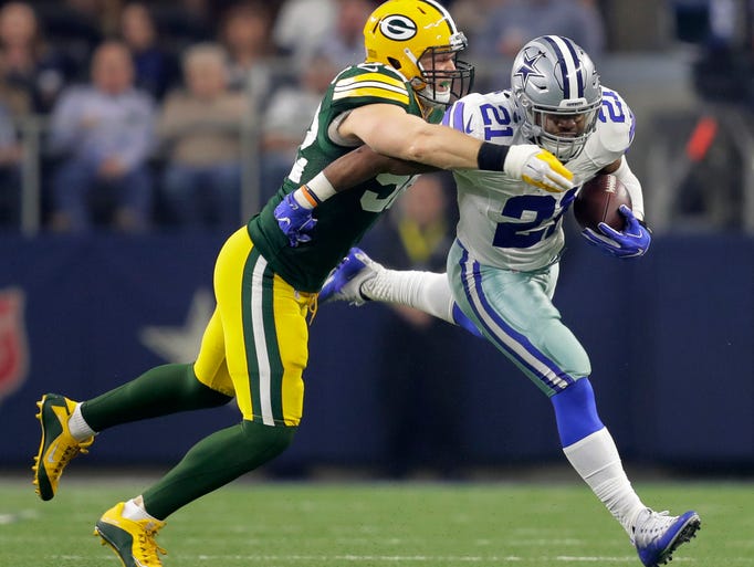 Green Bay Packers linebacker Clay Matthews tackles