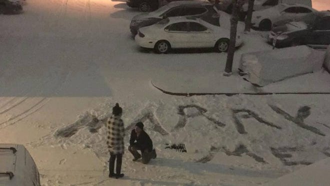 Matt Behrens proposed to his girlfriend Shannon Kernan Wednesday by carving out the request in the snow.