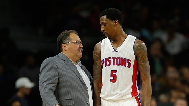 Head coach Stan Van Gundy talks to Kentavious Caldwell-Pope of the Detroit Pistons while playing the Utah Jazz at the Palace of Auburn Hills on October 28, 2015 in Auburn Hills.