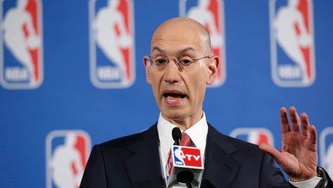 In this May 20, 2014, file photo, NBA Commissioner Adam Silver gestures during a press conference before the NBA draft lottery in New York.