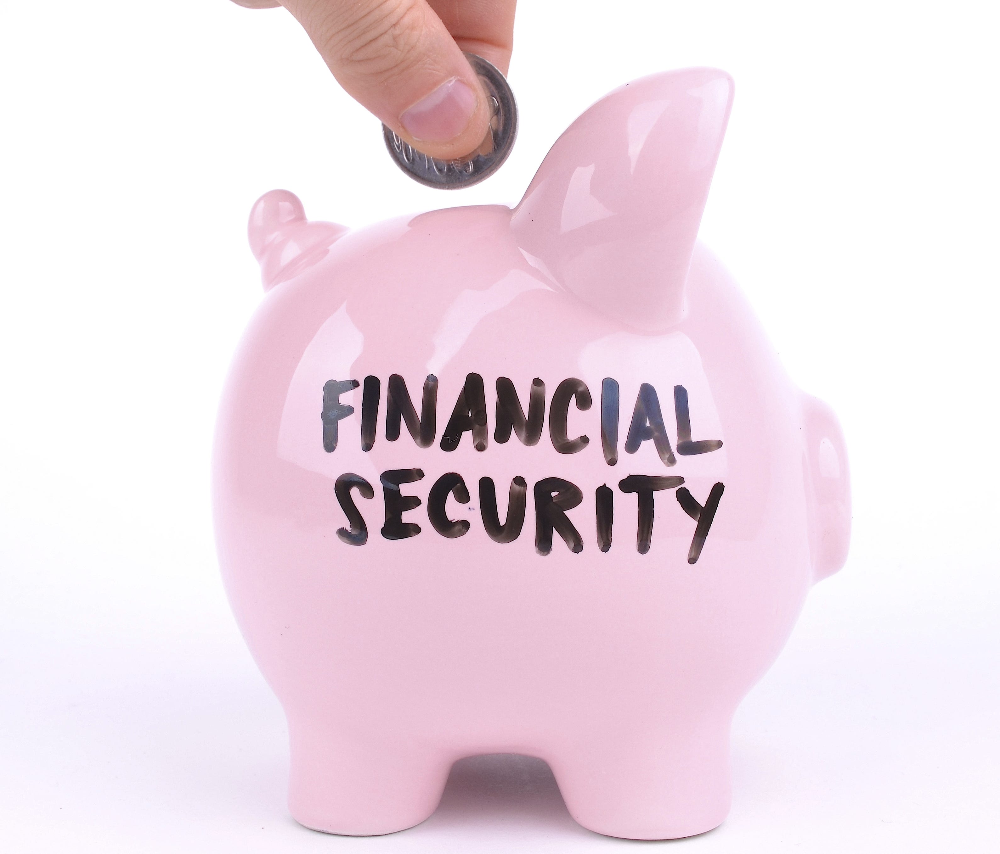 Photo illustration created in 2014 shows a piggy bank for saving toward retirement financial security.