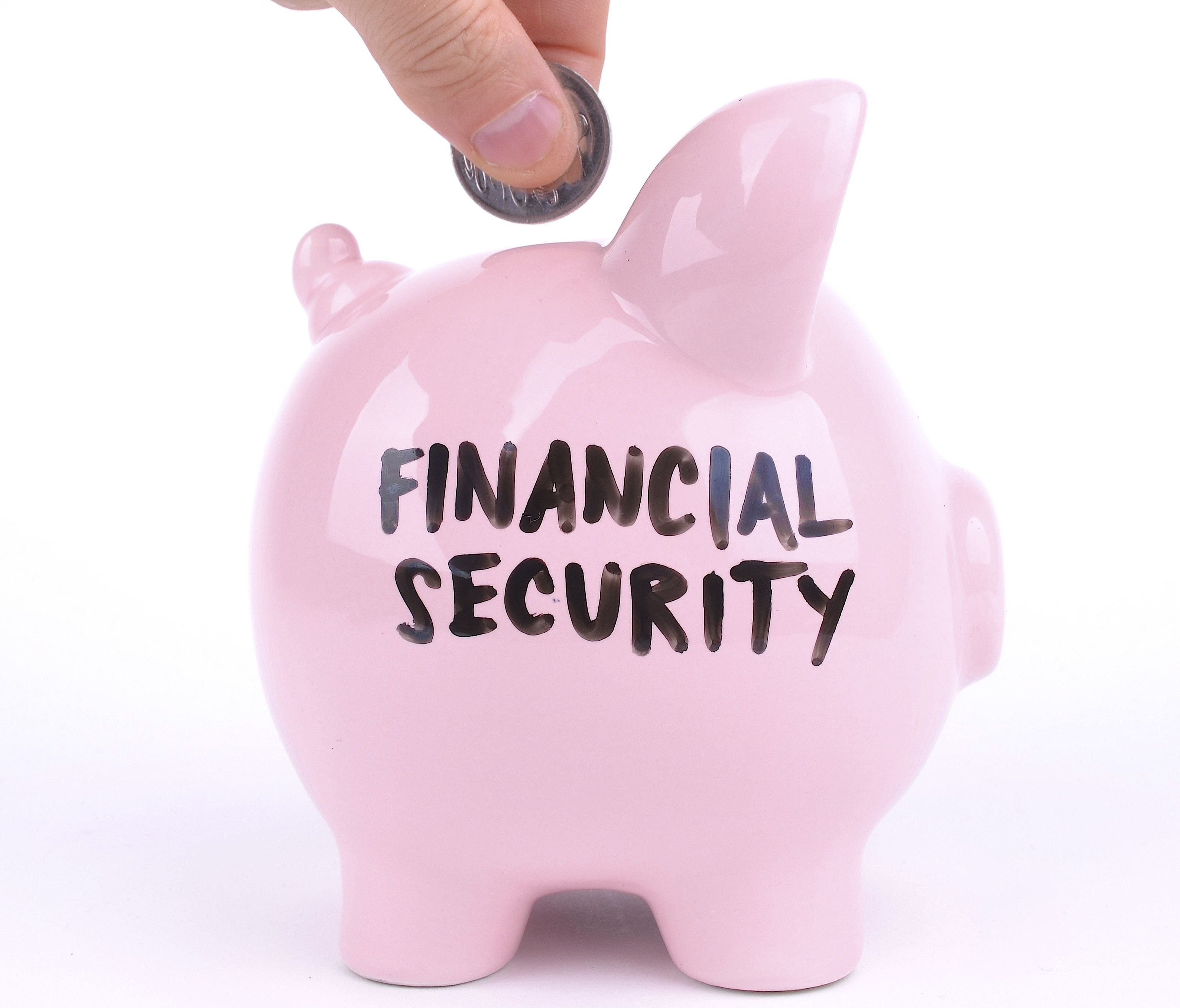 Photo illustration shows a piggy bank for saving toward retirement financial security.
