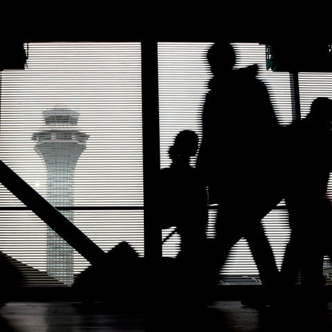 Travelers walk through terminal 3 at O'Hare Intern