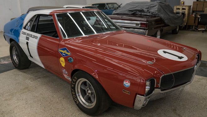 Craig Breedlove, who drove a jet-powered car to several land speed records, also drove this 1968 American Motors AMX to new records for its class. It is now owned by Bill Kotula of Chelsea. The car is being prepped for Autorama at Wrenchers, a restoration and hot rod shop in Novi.
