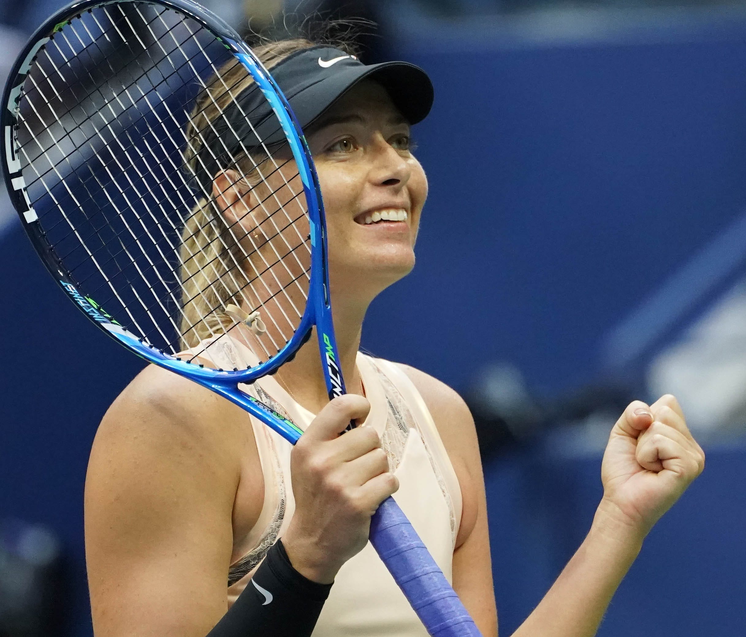 Maria Sharapova needed three sets and 2 hours, 19 minutes, but she's into the third round in New York.
