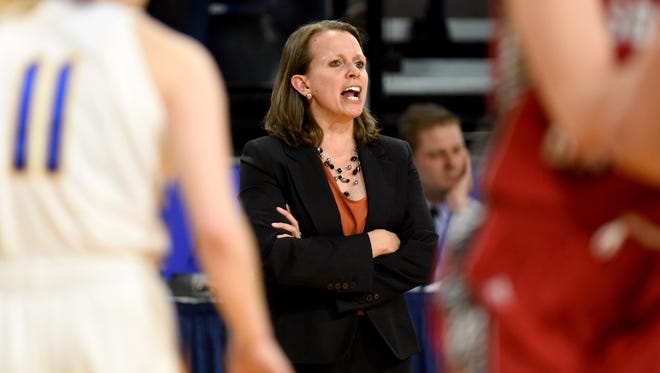 South Dakota coach Dawn Plitzuweit is in her second season at USD with an overall record of 45-14, including a 16-game win streak this season.