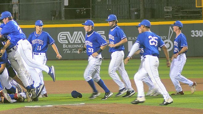 The Santa Barbara Foresters celebrate a 12-3 win over the Cheney Diamond Dawgs Monday night in the championship game of the 86th NBC World Series at Eck Stadium. The Foresters win their eighth NBC title.