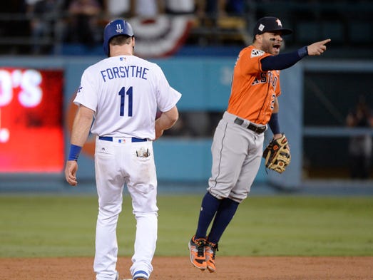 Game 7 at Dodger Stadium: Jose Altuve celebrates after