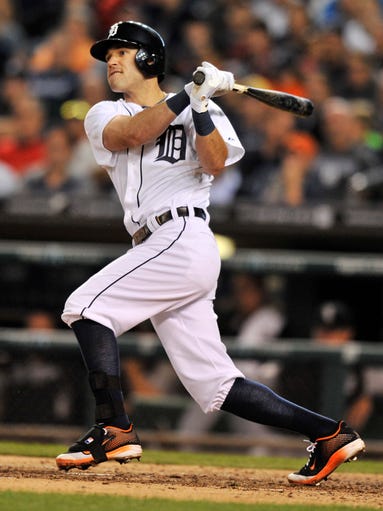 Tigers' Ian Kinsler hits a line drive single to score Andrew Romine to make it 2-0 Tigers in the seventh inning.