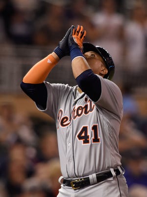 Tigers DH Victor Martinez celebrates a two-run home run during the seventh inning of the Tigers' 8-3 win over the Twins Tuesday in Minneapolis.