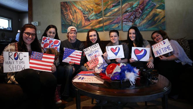 Haley Biemiller, left, and her friends are headed to the Super Bowl.