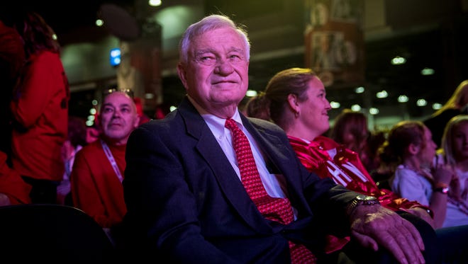 Cincinnati Reds owner Bob Castellini watches the players being announced onto the main stage at Redsfest at the Duke Energy Convention Center in downtown Cincinnati Friday, December 1, 2017.