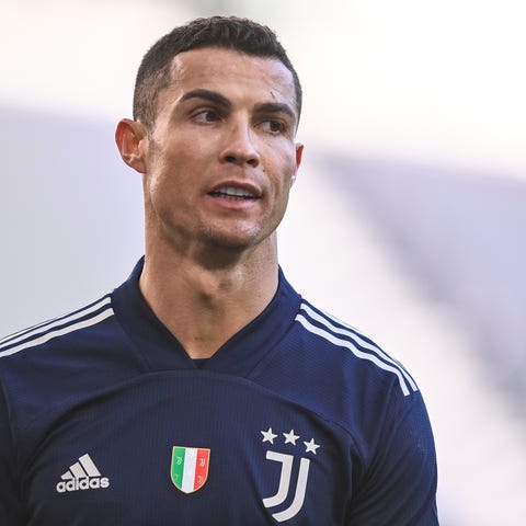 Juventus' Cristiano Ronaldo walks on the pitch dur