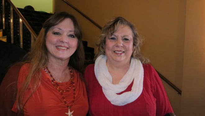Lisa Cozens of Redding (left) and Marsha O'Quinn of Anderson attend the "Gone with the Wind" film party Feb. 12 at the Cascade Theatre in Redding.