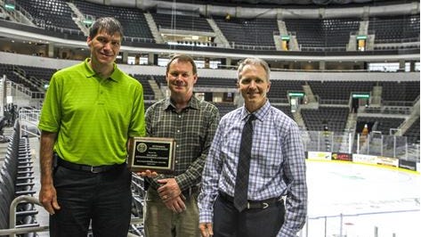 From left are city engineers Shannon VerHey, Terry Van Dyke and Public Works Director Mark Cotter in the Denny Sanford Premier Center.