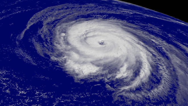 A satellite image shows Hurricane Helene spinning in the Atlantic in 2006. Meteorologists predict hurricane activity in the Atlantic will increase in early September.