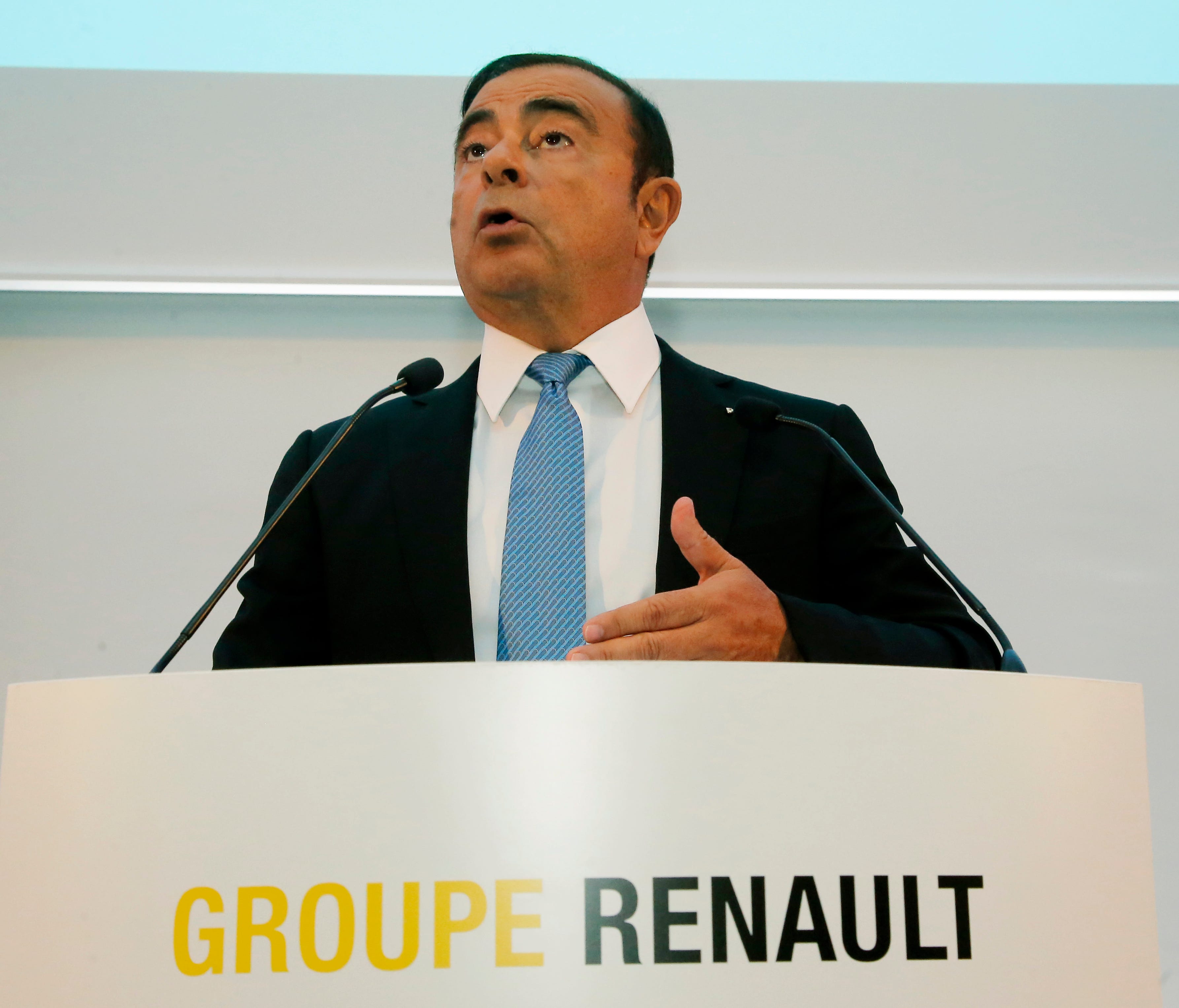 Renault Group CEO Carlos Ghosn speaks during a media conference at La Defense business district, outside Paris, France, Friday, Oct. 6, 2017. French carmaker Renault says half of its models will be electric or hybrid by 2022 and it's investing heavil