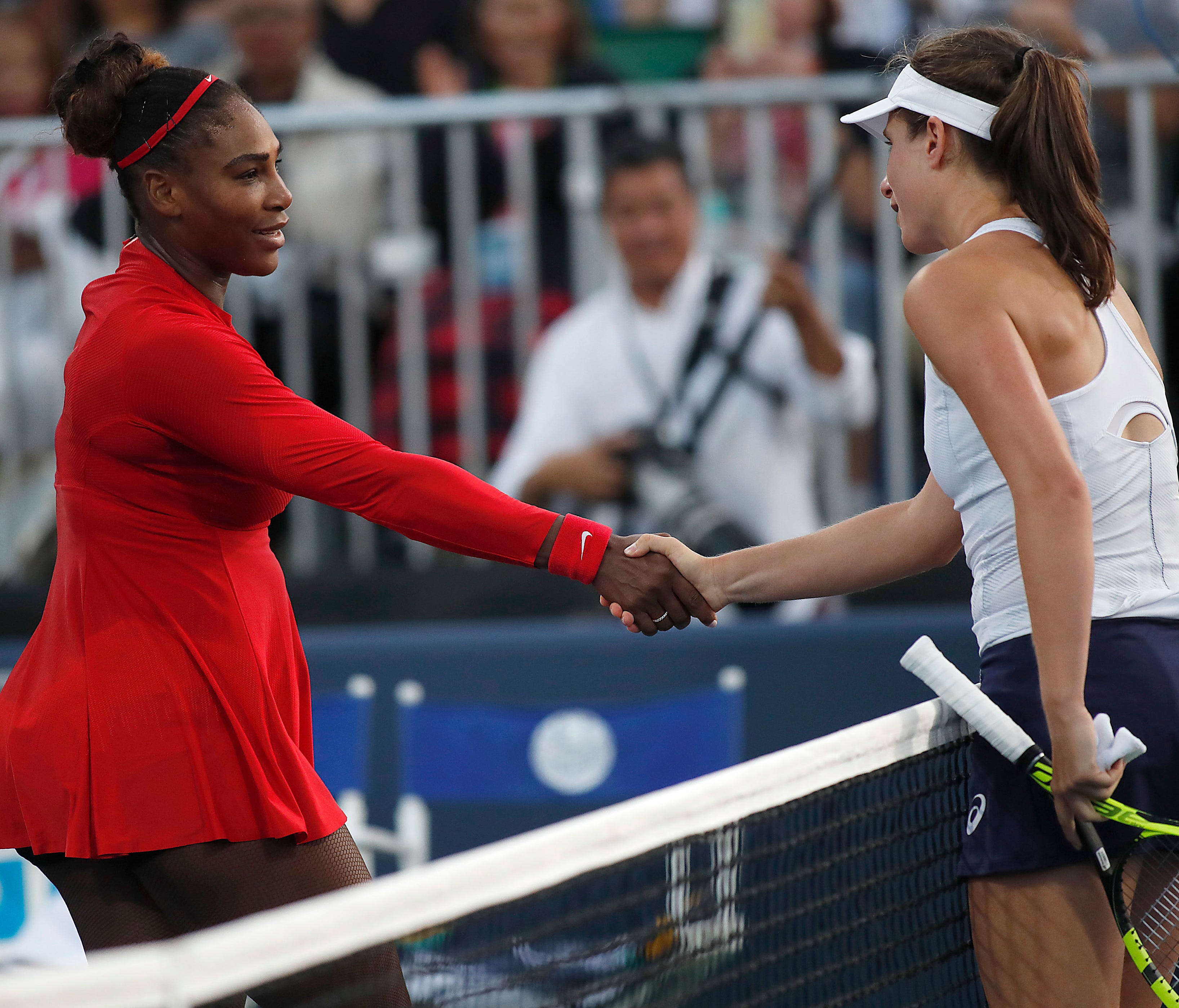 Serena Williams shakes hands with Johanna Konta at the end of their Mubadala Silicon Valley Classic match.