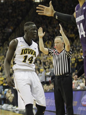 Iowa guard Peter Jok reacts after hitting his third 3-pointer in a row during Sunday's win over Northwestern.